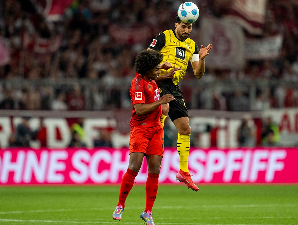 Can im Kopfballduel mit FC Bayern München Spieler Gnabry (Foto)